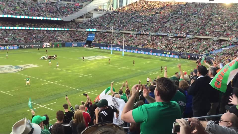Packed stadium crowd at a major rugby match